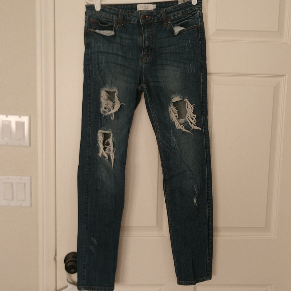 Distressed dark wash women's jeans